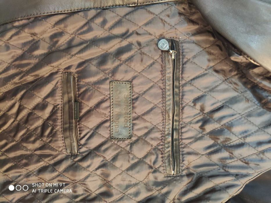 Куртка кожаная с меховым воротником