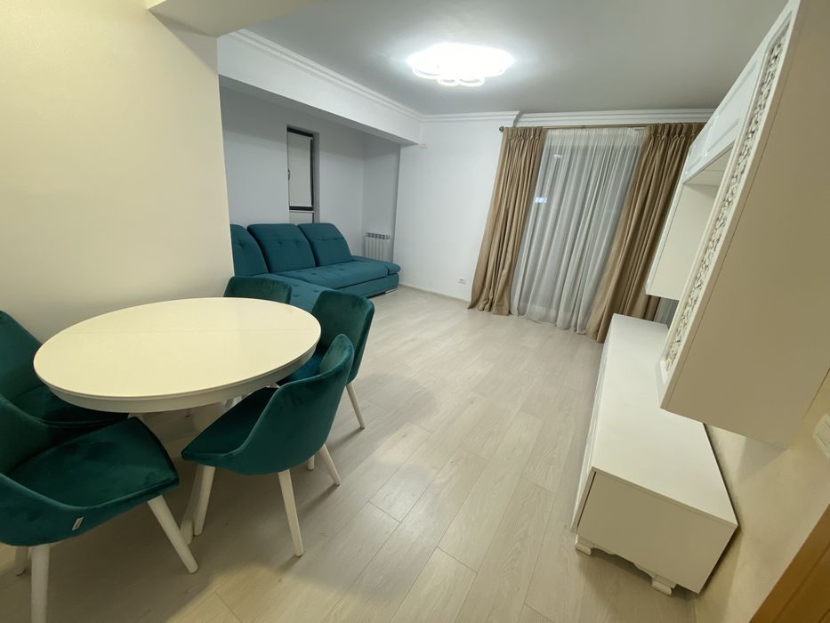 Inchiriez apartament 3 cam 95 mp bloc nou+loc parcare subteran