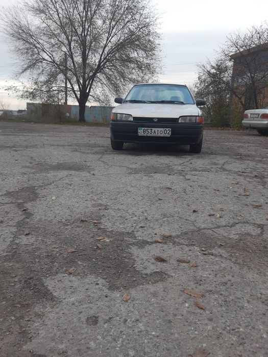 Машина мазда 323