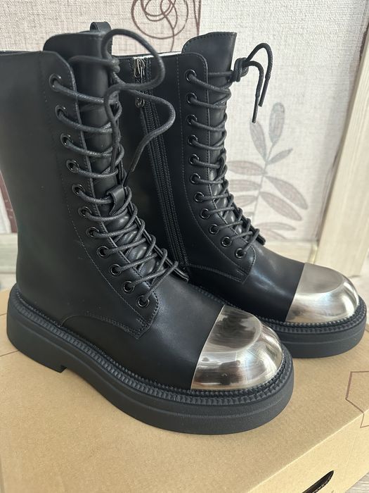 Продам сапоги новые