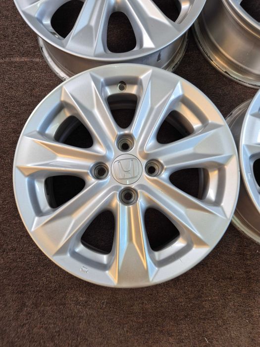 4 Jante Aliaj 4x100 15'' 5.5J ET 45 - OEM Honda JAZZ - Enkei Japonia - JANTE CA NOI !