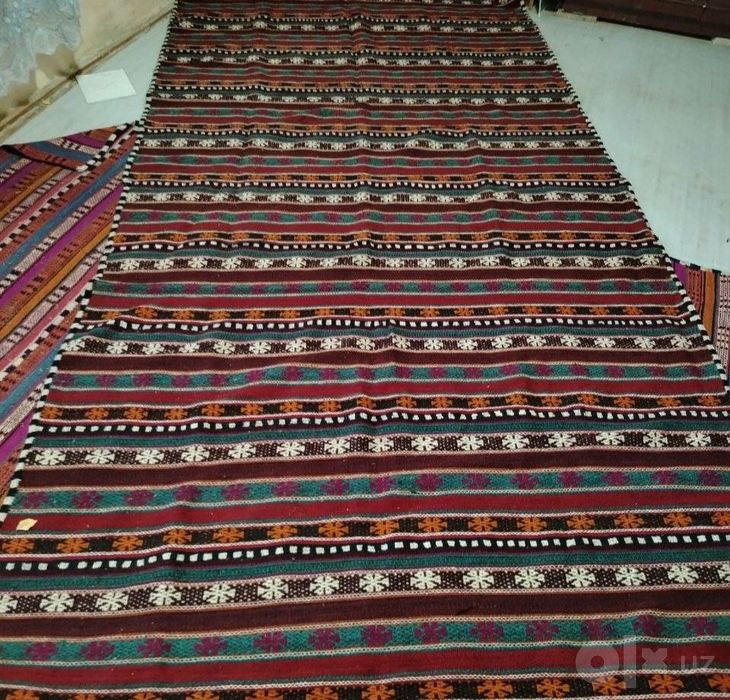 Gilam  qoʻy junidan toʻqilgan