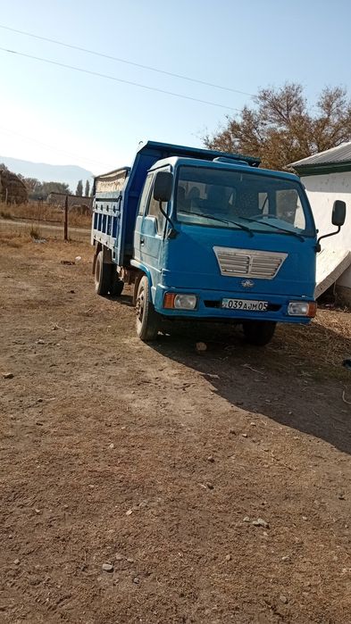 Жүкті өзі түсретін машина