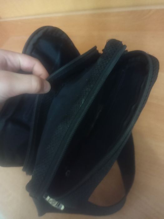 Барсетка не ношеная