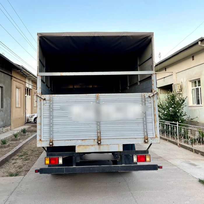 ISUZU Бортовой с тентом