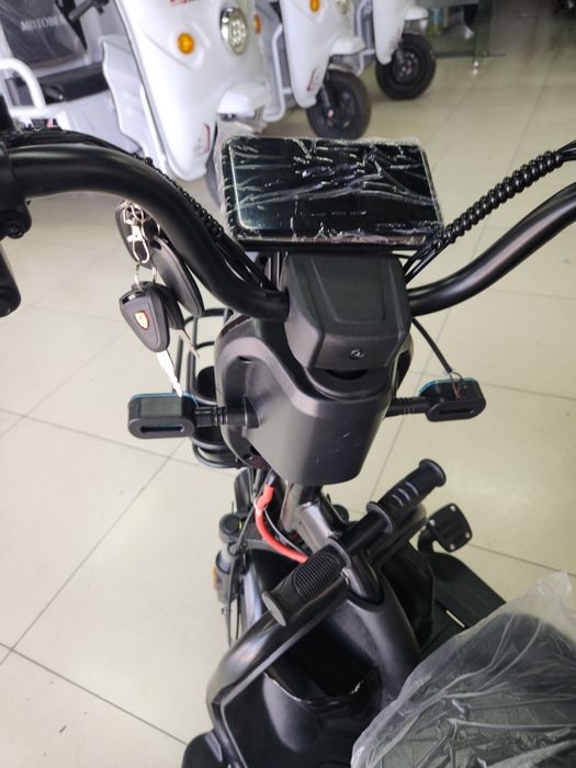 Трех колёсный электроскутер для тех кто любит комфорт