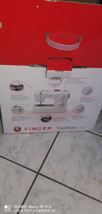 Mașina de cusut singer