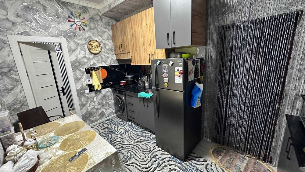 2 хона килинган+подвалиниям уй килган квартира сотилади 5 микрн