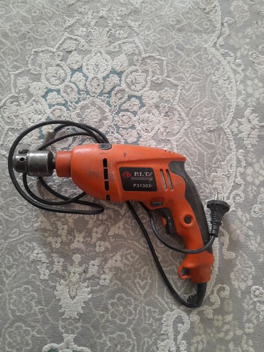 Ударный дрель б/у