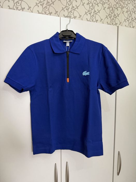 Поло lacoste синего цвета