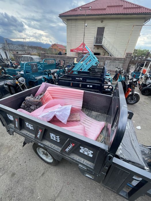 Электрлік жүк трицикл самосвал