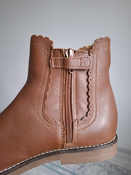 Продам кожанный сапоги