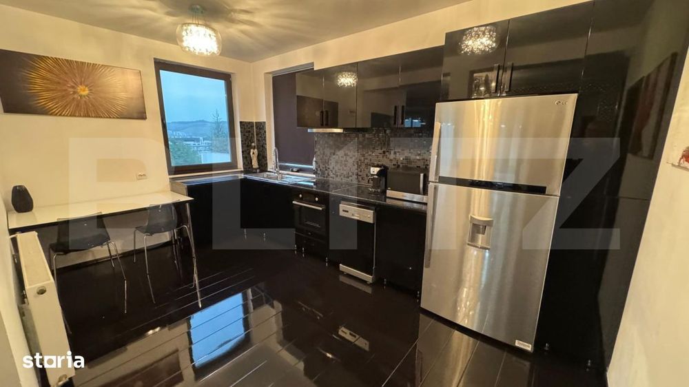 Casa individuala cu 4 camere, 500 mp de teren, garaj de 60 mp, zona Vi