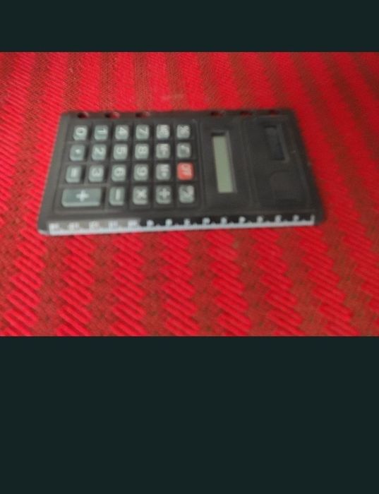 Școala rechizite, calculator și rigla de măsurat
