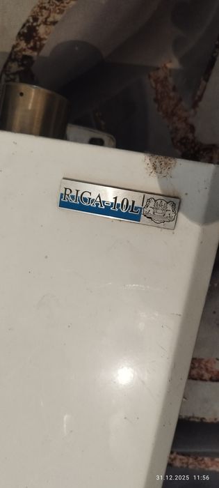 Газовый колонка.