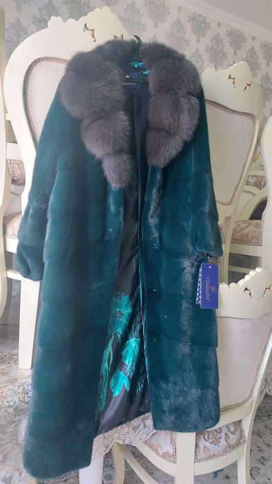 Продам норкавая шуба новый