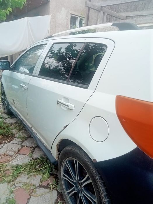 Машина Geely MK Cross 2015