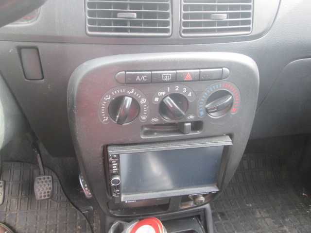 Daihatsu Cuore 2005,benzină