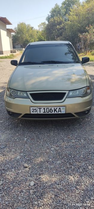 Nexia 2 2009 xolati zo'r oldi orqa butun