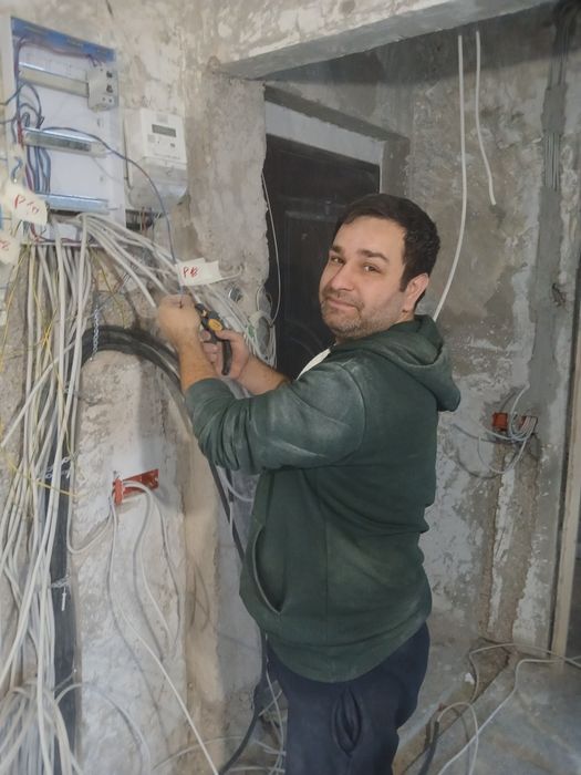 Electrician București