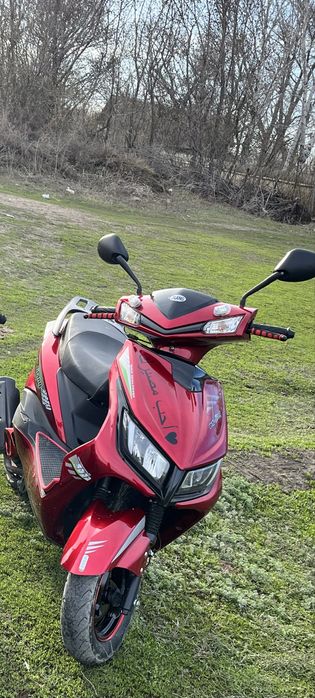 Скутер на ходу ,