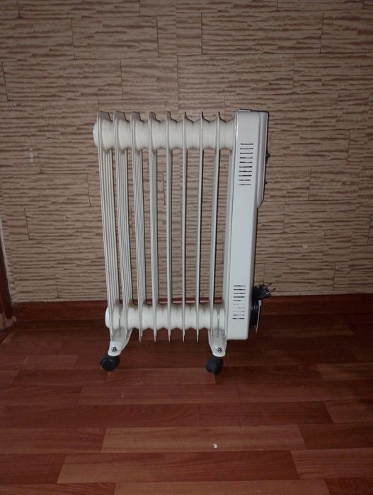 Масляный обогреватель новый