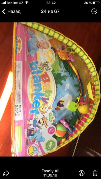 Коврик с подвесными игрушками 150.000