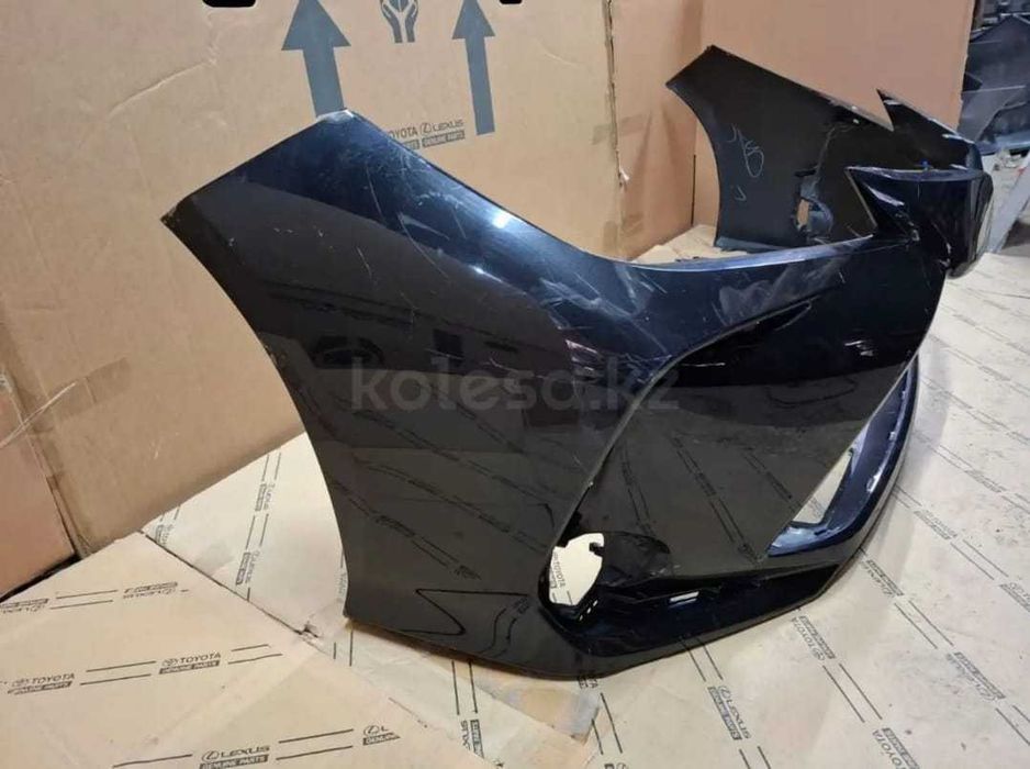 Бампер передний б/у в оригинале на Toyota Corolla E210