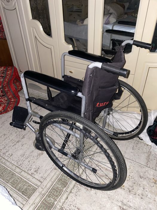 Инвалидная коляска