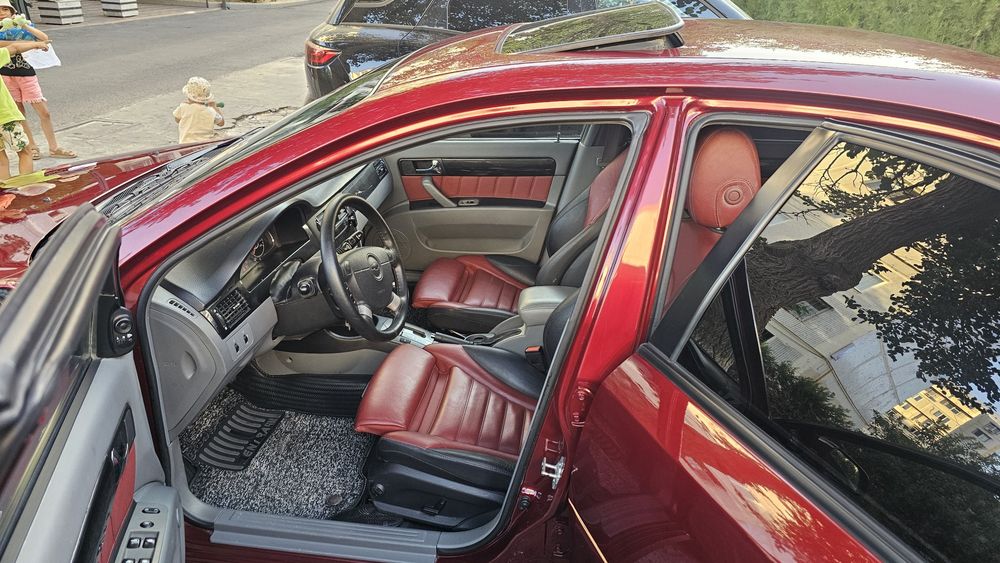 Gentra 2021 автомат коробка, цвет вишневый