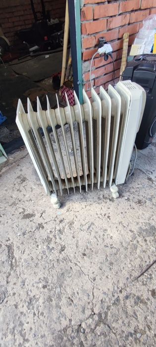 Продам масляный электрообогреватель