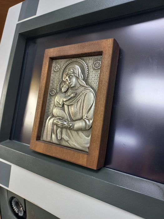 Посребрени икони на Богородица,Св.Николай,Св.Георги и Архангел Михаил.