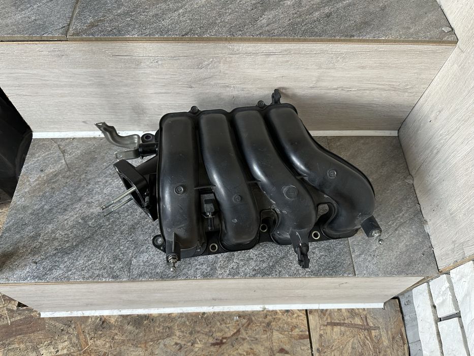 Впускной коллектор Toyota Corolla 210