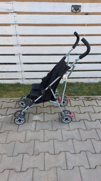 Carucior copii bebe Model pliabil foarte usor 4 kg , pt luat in avion Marca Kolcraft Cloud
