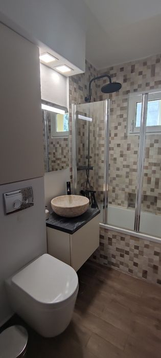 Apartament cu 3 camere + loc de parcare