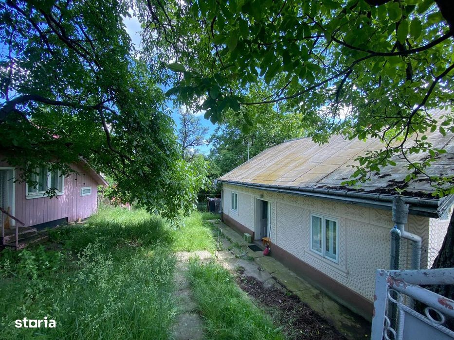 1400 mp teren  si casa Burdujeni - zona Primariei