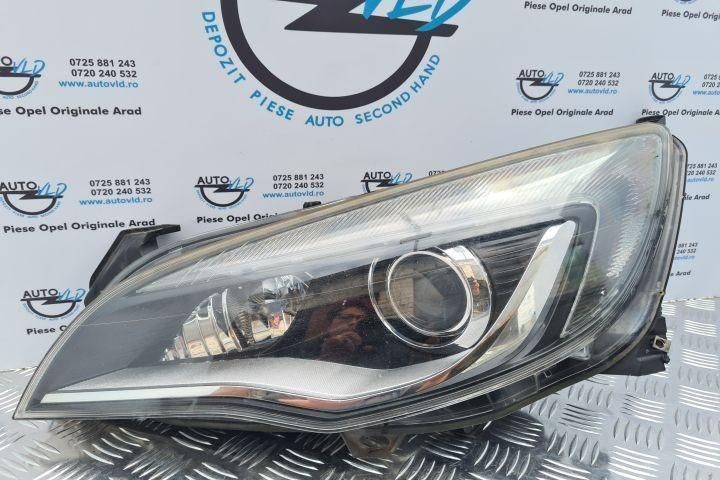 Far xenon stanga Opel Astra J