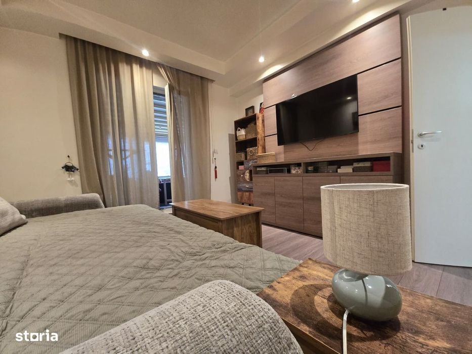 COSMOPOLIS - Apartament cu 2 camere si gradina, mobilat si utilat.