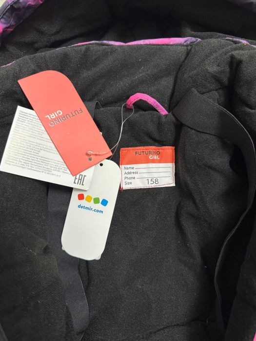 Продам новый зимний комбинезон для девочки.