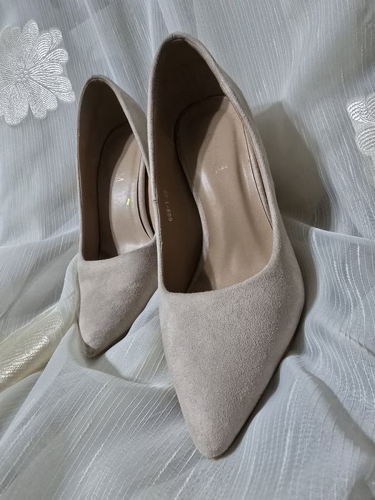 Pantaloni cu toc lat