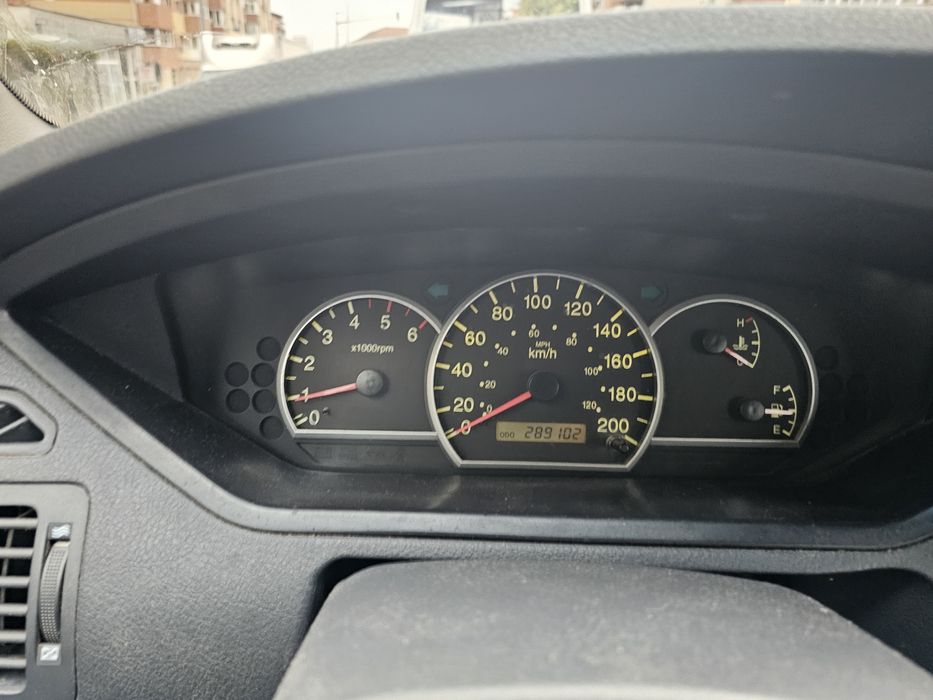 Kia Carens 2 2005 luna 10