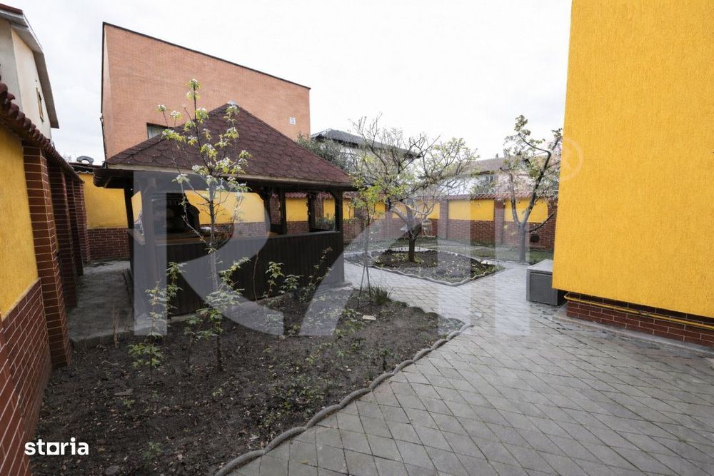 Casa cu stil, noua si la cheie, cu o curte superba, in zona centrala