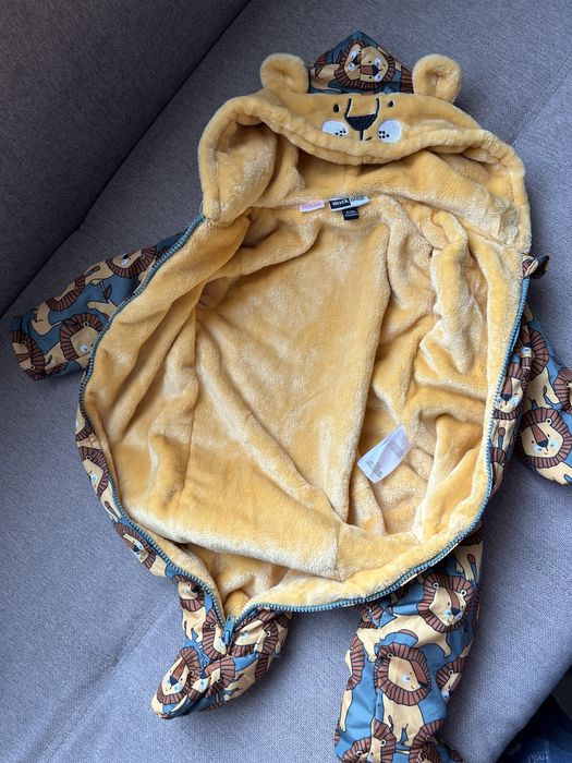 Бебешки космонавт с лъвчета (6–9 месеца)