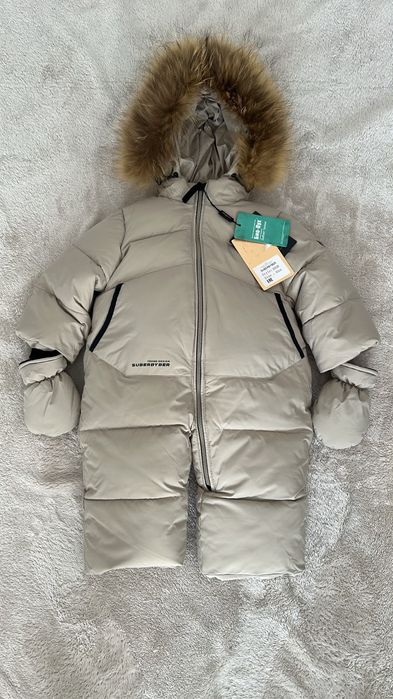Продам новый комбинезон до года