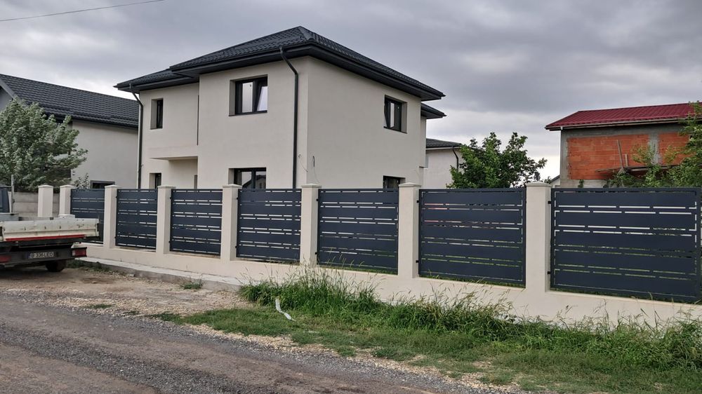 Placări cu panouri Sandwich, montaje uși de garaj și industriale