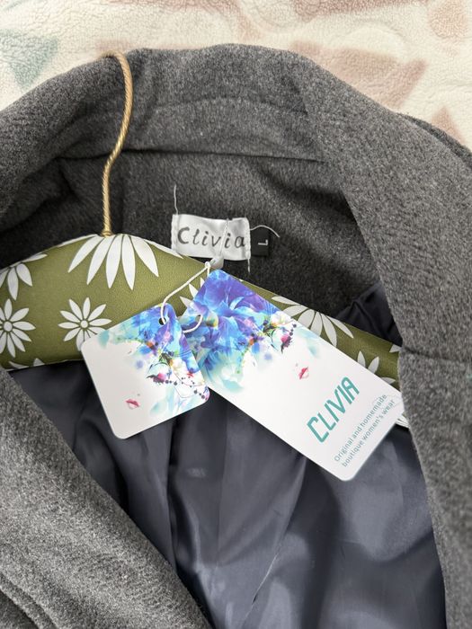 Palton nou ci eticheta