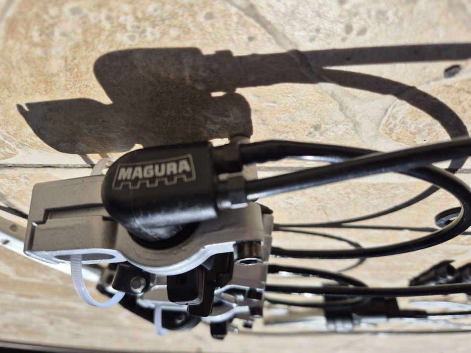 Set frane hidraulice Magura HS11-EVO2, inclusiv 2 perechi saboti noi