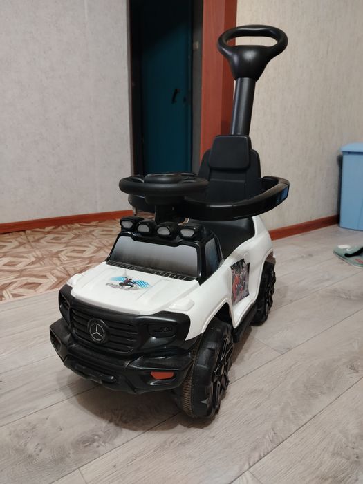 Толокар с родительской ручкой