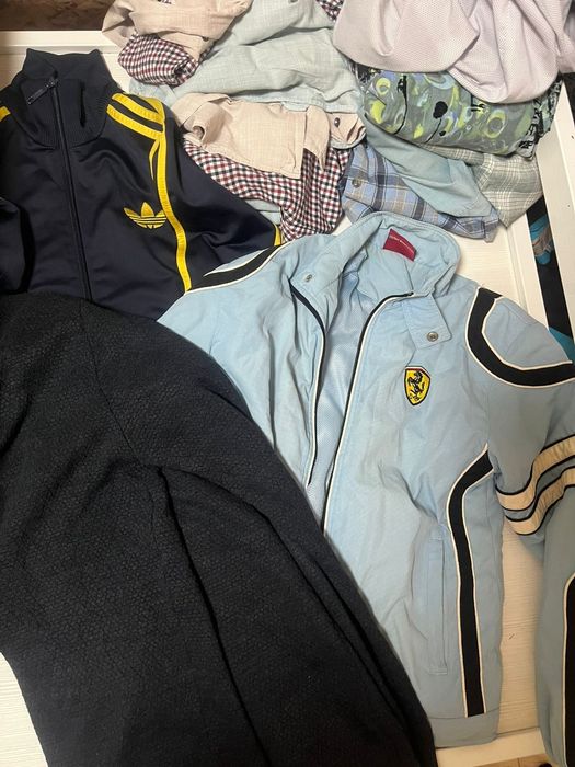 Мужская одежда много