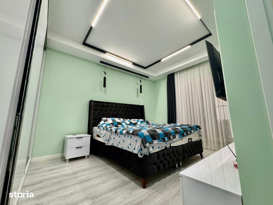 COSMOPOLIS - Apartament cu 3 camere si gradina, mobilat si utilat.